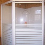 Shower and sink in hut.