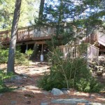 Extensive decking provides a magnificent view of lake -- which is just steps from the cottage!