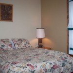 4th (main floor) bedroom. Queen bed. 4th (main floor) bedroom. Queen bed.