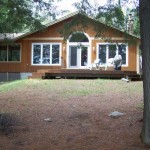 Welcome to Lynne's Hideaway -- a secluded 6 acre lakeside retreat. Property gently slopes to the lake. Note screened-in porch. Welcome to Lynne's Hideaway -- a secluded 6 acre lakeside retreat. Property gently slopes to the lake. Note screened-in porch.