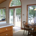 Dining room and living room look out over lake. A walk-out to deck. Lots of windows welcome in the great outdoors. Patio table & chairs for outdoor dining. Propane BBQ. Dining room and living room look out over lake. A walk-out to deck. Lots of windows welcome in the great outdoors. Patio table & chairs for outdoor dining. Propane BBQ.