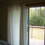 Walk-out from master bedroom to lakefront balcony.