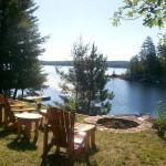 Nestled in a quiet bay behind an island, enjoy the lakeside fire pit. Southern exposure for all day sun and terrific sunsets. Nestled in a quiet bay behind an island, enjoy the lakeside fire pit. Southern exposure for all day sun and terrific sunsets.